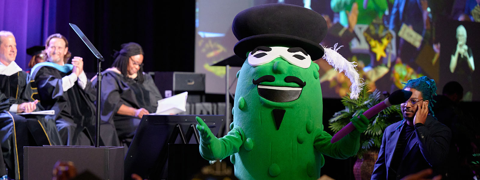 The Fighting Pickle mascot at the 2024 UNCSA Commencement