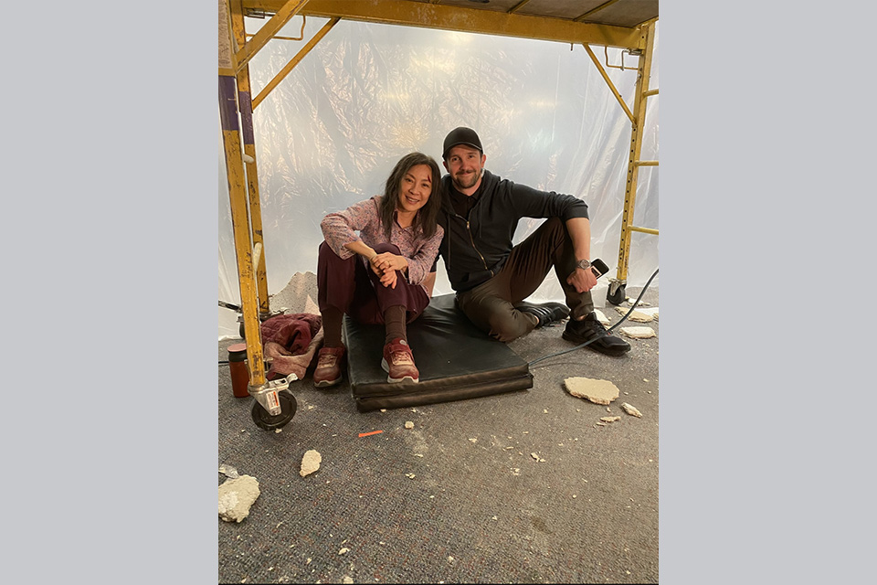 Eulich and actress Michelle Yeoh on the set of “Everything Everywhere All at Once” / Photo courtesy of Timothy Eulich