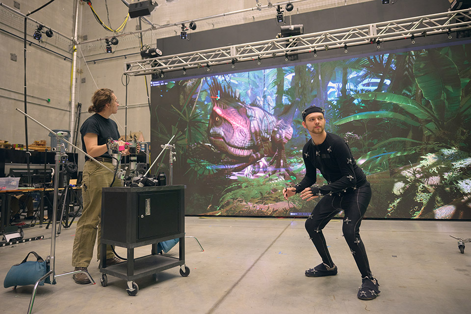 Students learning motion capture in the Cube at the Center for Design and Innovation. / Photo: Wayne Reich 