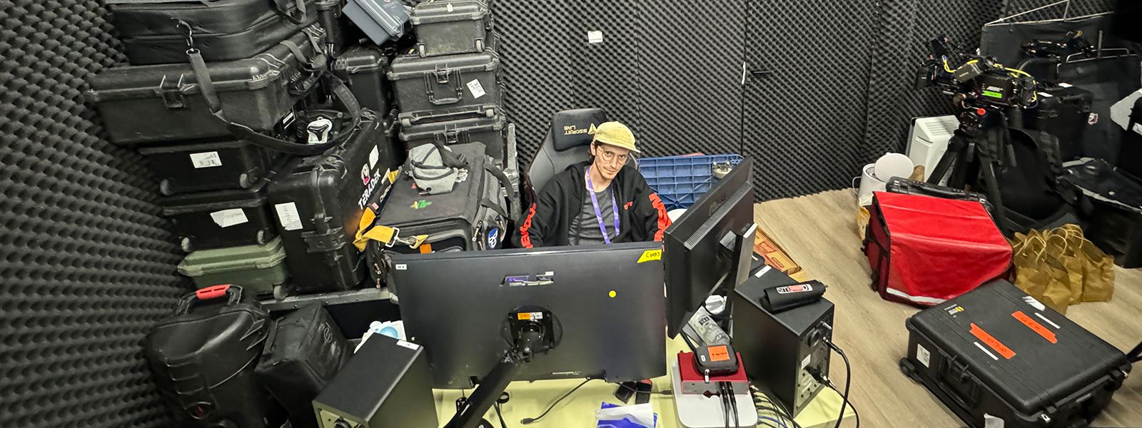 Aaron Greenbaum sitting behind a computer while editing / Contributed photo