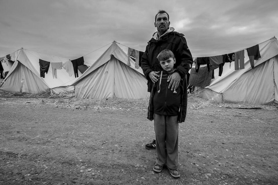 Father and Son, 2016, Petra Refugee Camp, Greece; Photo: Tariq Tarey