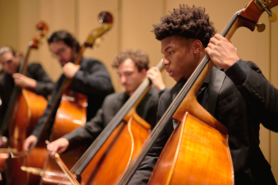 Gavin Hardy playing double bass in the UNCSA Symphony Orchestra