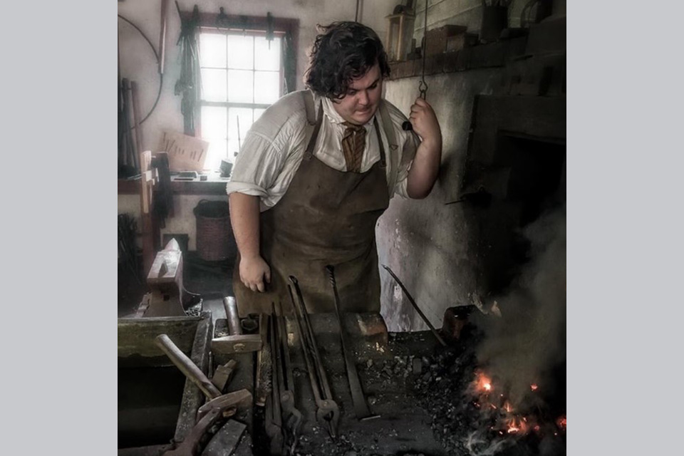 Henry Beard working as a blacksmith