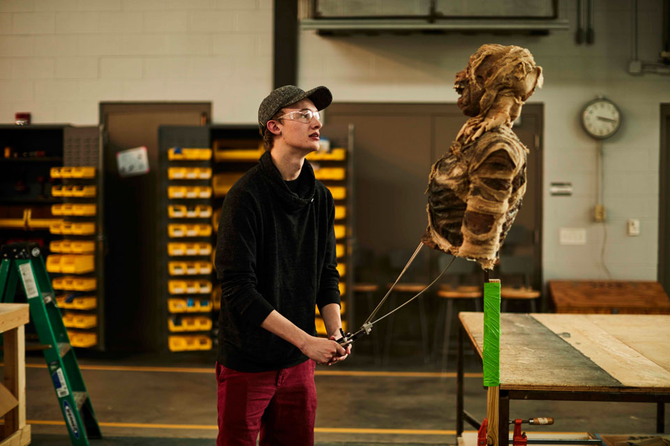 Production Design student testing mummy puppet / Photo: Jeremy Cowart